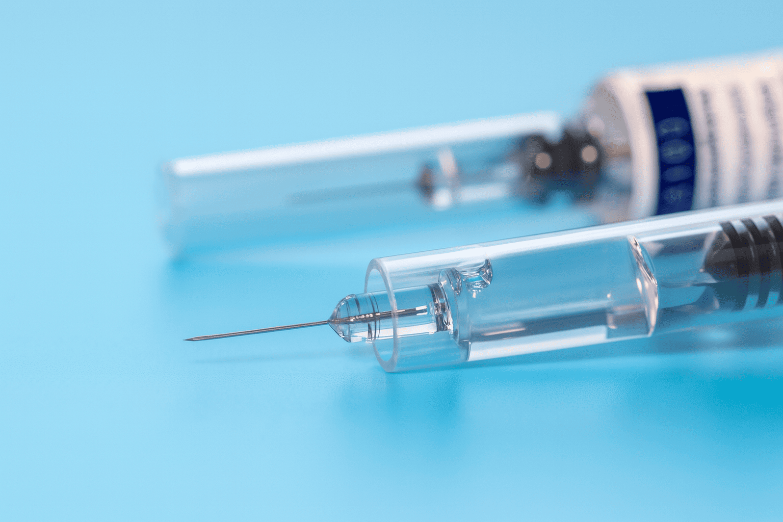 Pre-filled syringe with safety system